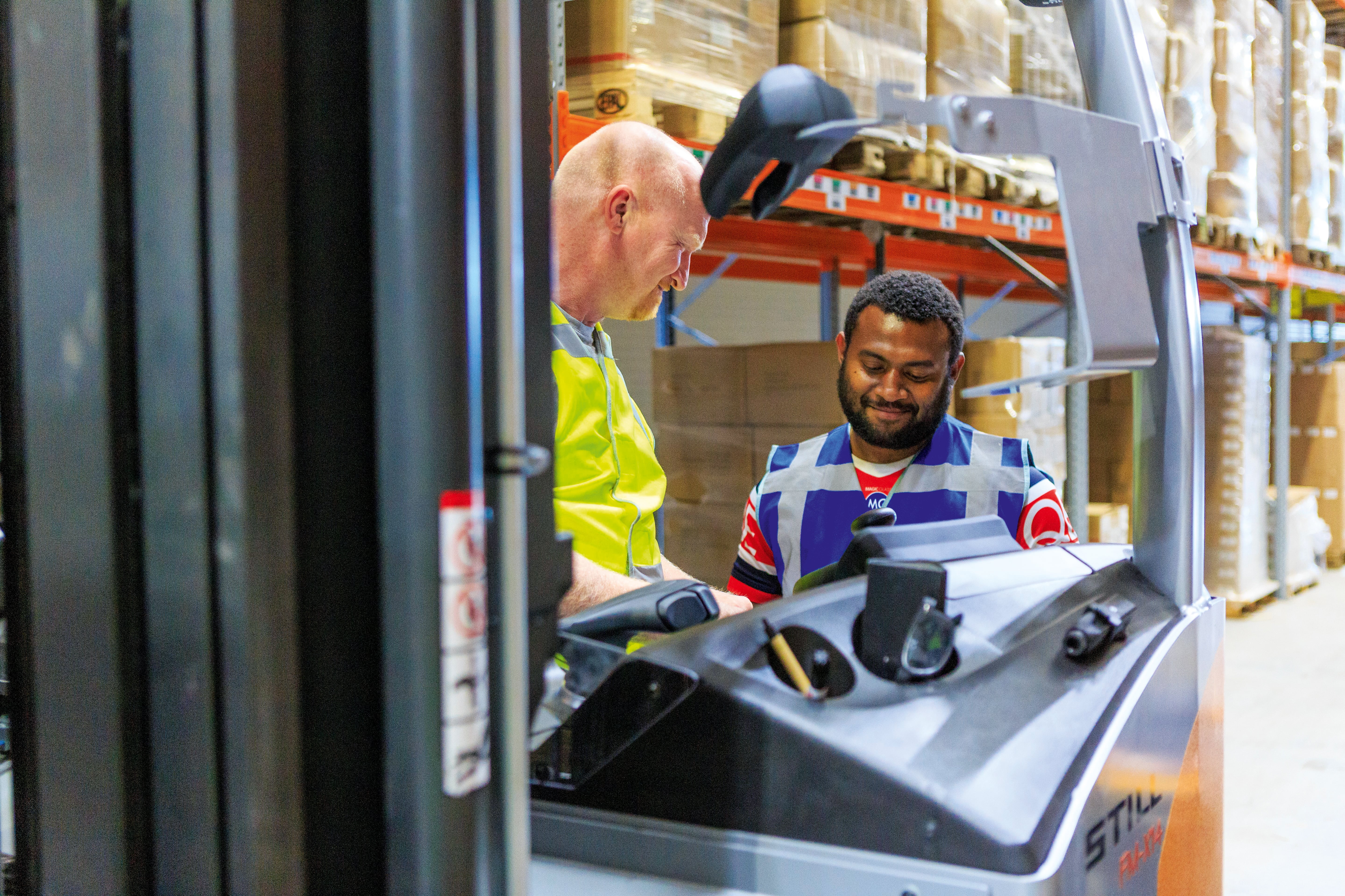 Discussing stock levels in the warehouse at the Worldpack facility in Eindhoven in The Netherlands