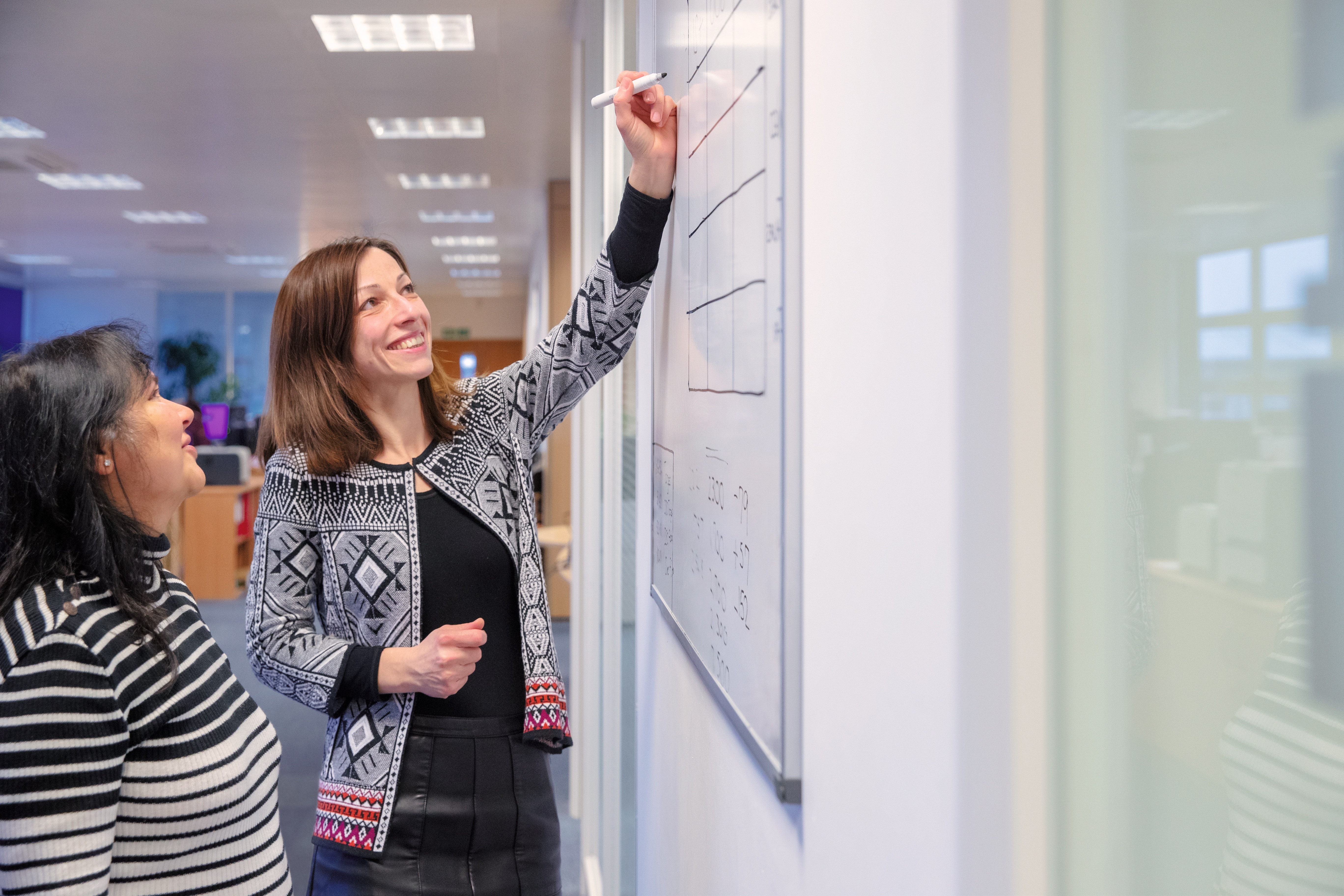 Discussing schedules in the Bunzl office