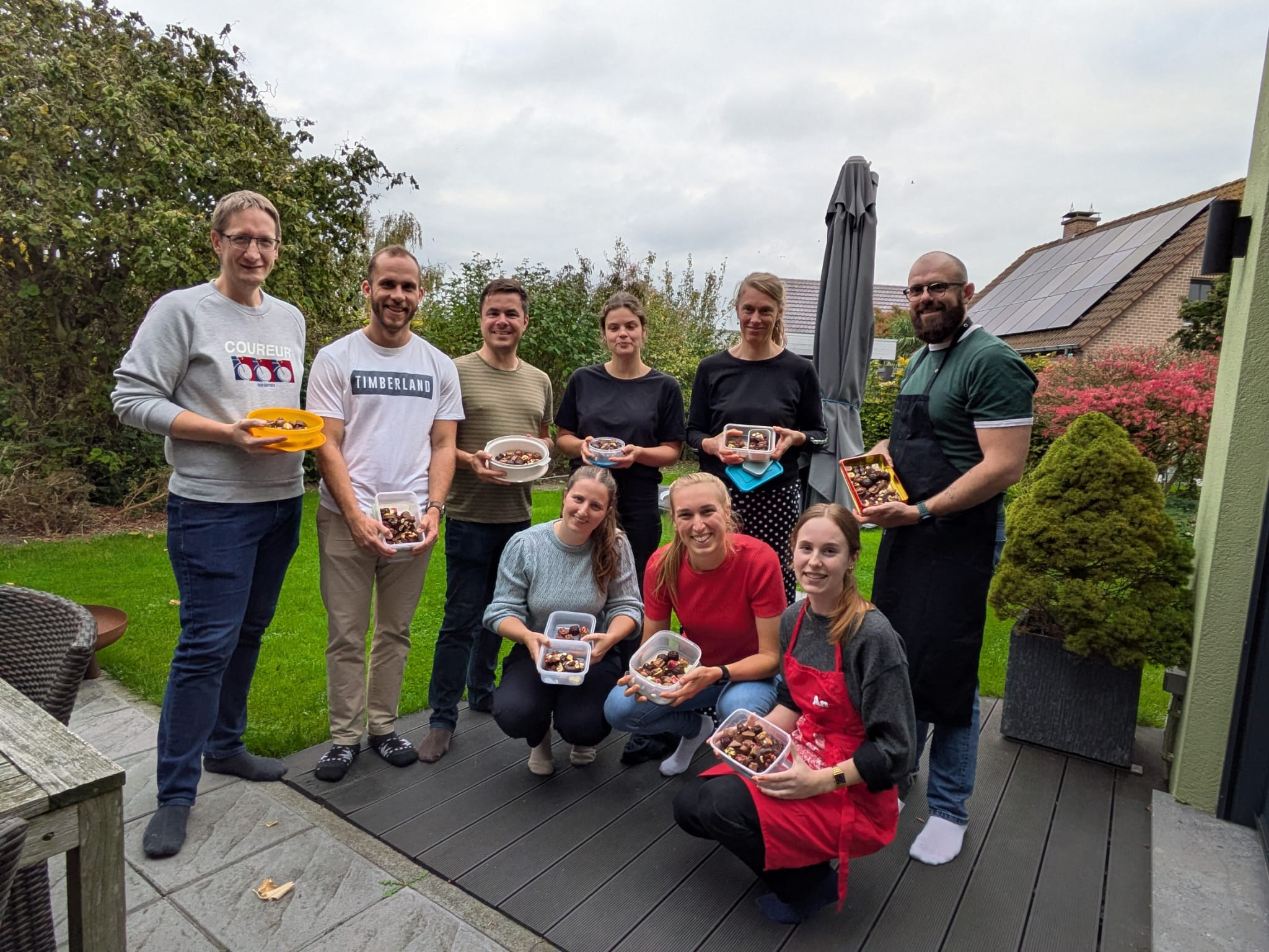 The team of project managers and analysts rolled up their sleeves during a chocolate workshop.