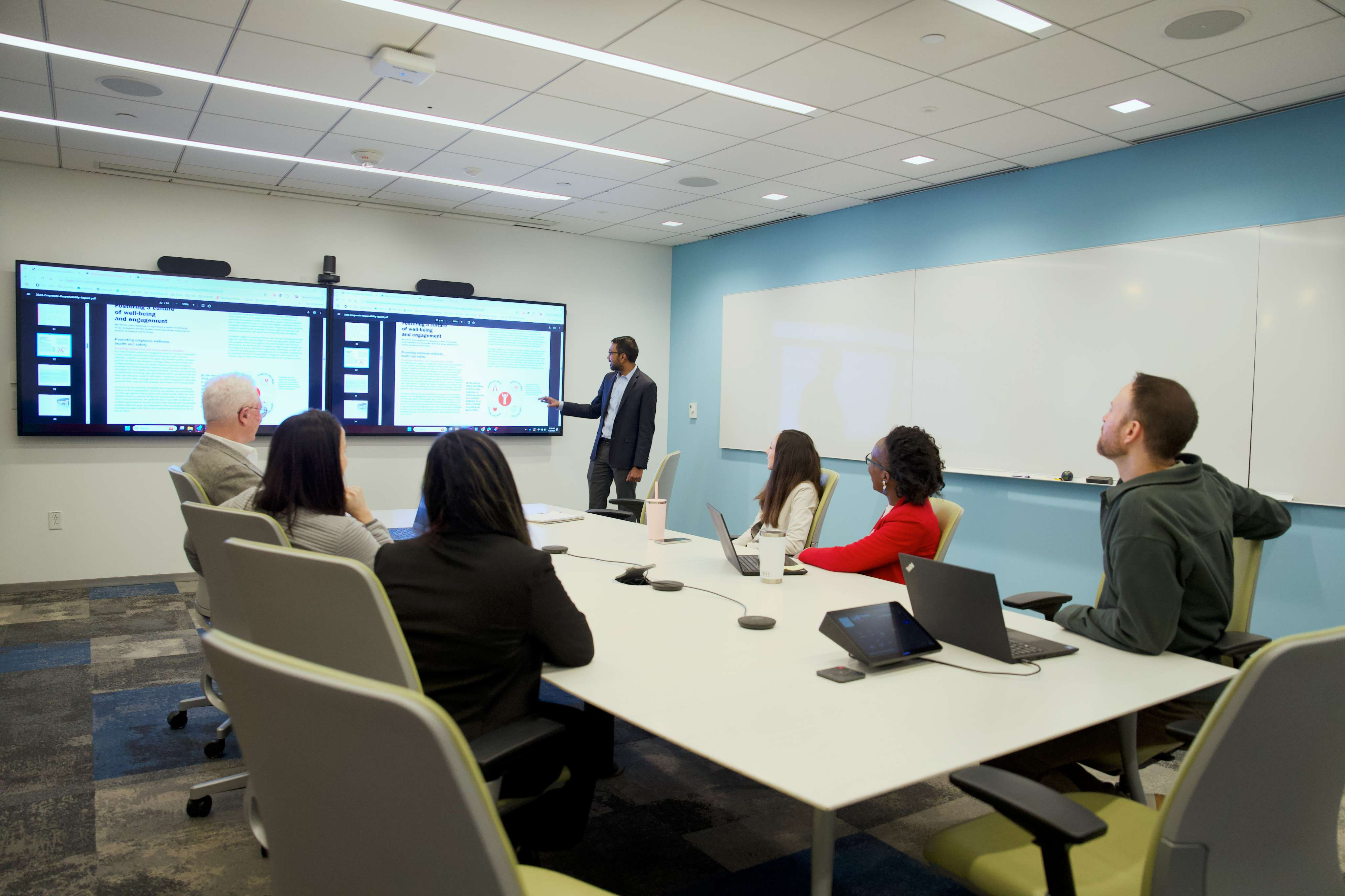 Employees in a large conference room