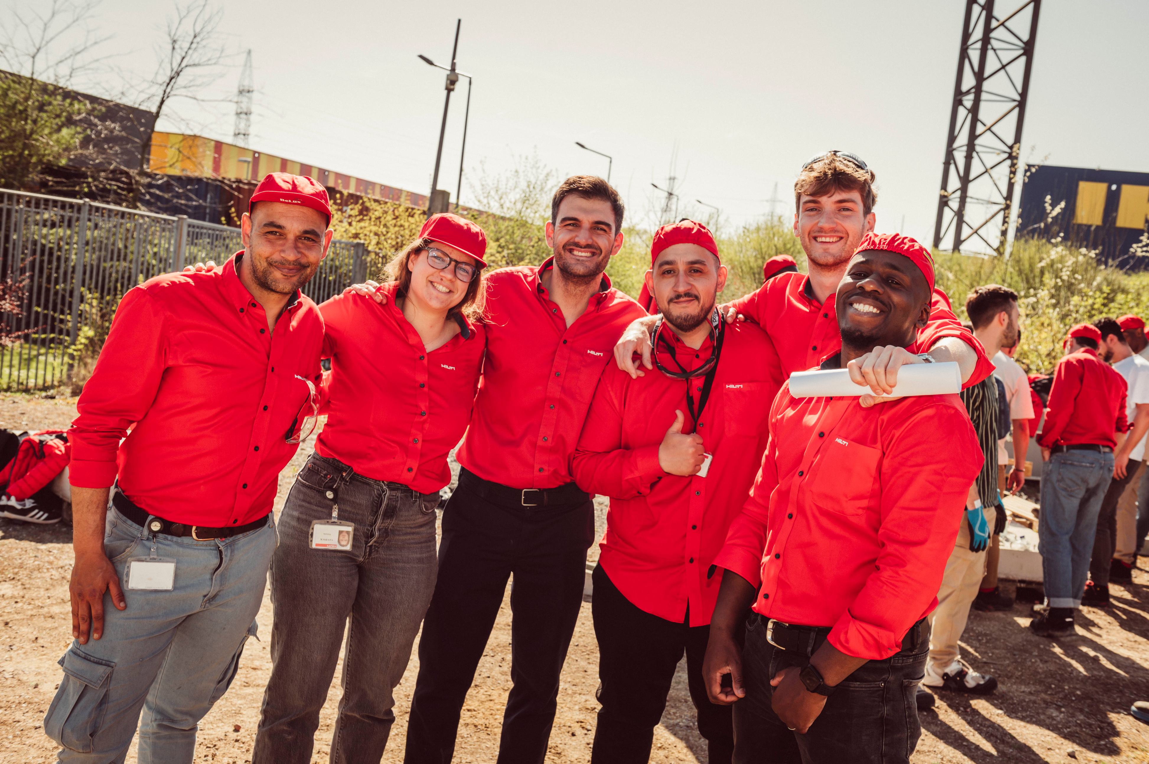 The lovely Building & Construction team during their hands-on training, proudly wearing our distinctive red Hilti shirts